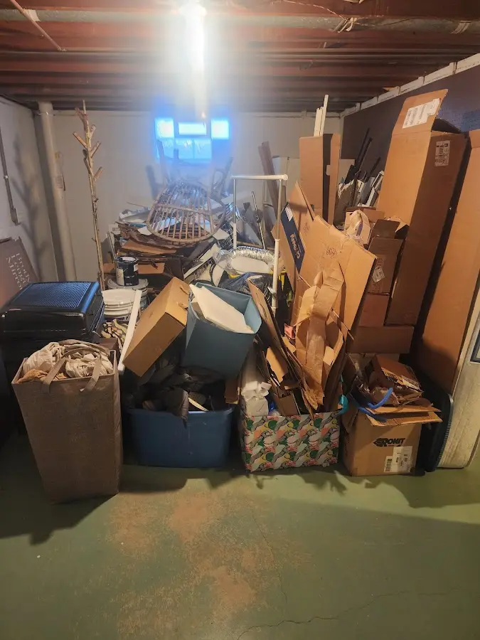 Roll-off dumpster container at job site for 4 Yard Dumpster Rental in Credit River